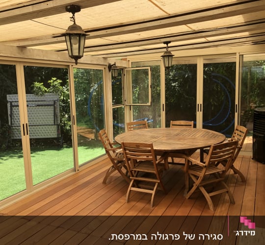 Sliding aluminium doors in a sunlit room